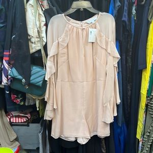 Romper, pink.  Never worn size 4